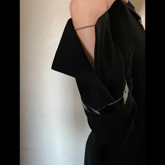 COPY - Elegant light weight duster. Tailored with faux leather trim.